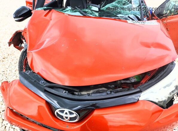 JTMNFREV6GJ090854 2016 TOYOTA RAV4 Orange Rear interior view