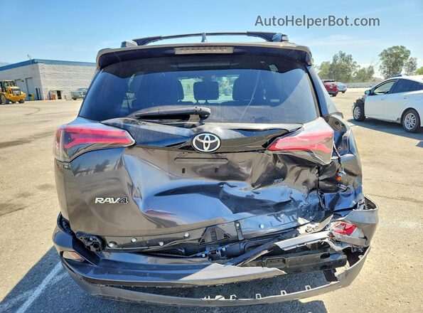JTMNFREV7JJ194650 2018 TOYOTA RAV4 Gray Widok z tyłu