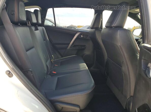 JTMNFREV8GJ067740 2016 TOYOTA RAV4 Белый Вид задней части салона