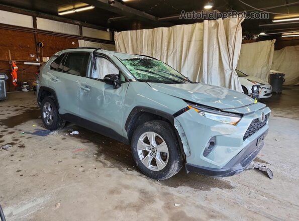 JTMP1RFV5KD505319 2019 TOYOTA RAV4 Green Front right