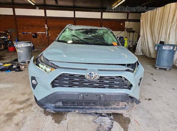 JTMP1RFV5KD505319 2019 TOYOTA RAV4 Green Front view