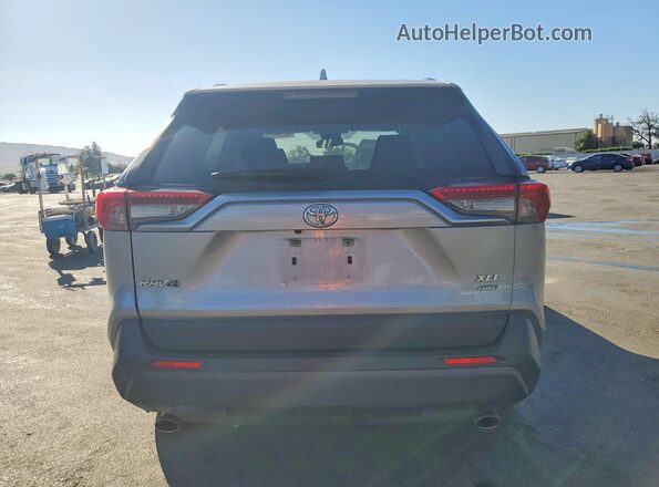 JTMP1RFV7KD507296 2019 TOYOTA RAV4 Серебряный Вид сзади