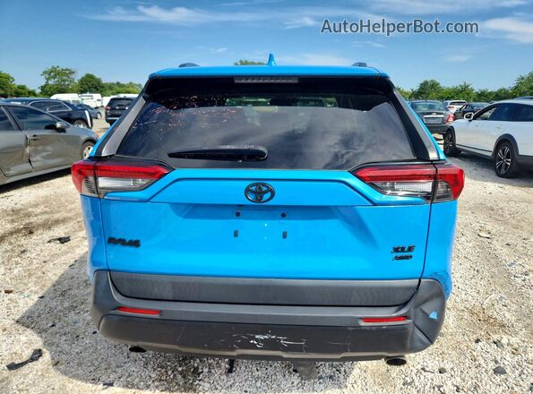 JTMP1RFV8KJ014812 2019 TOYOTA RAV4 Blue Vista interior delantera