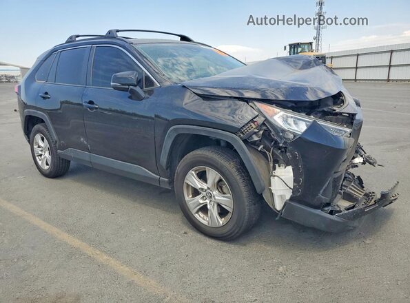 JTMP1RFVXKD026409 2019 TOYOTA RAV4 Black Delantero derecho
