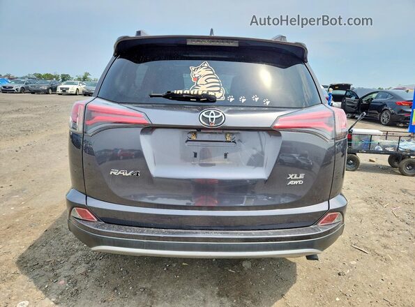 JTMRFREV0JJ206607 2018 TOYOTA RAV4 Gray უკანა ხედი