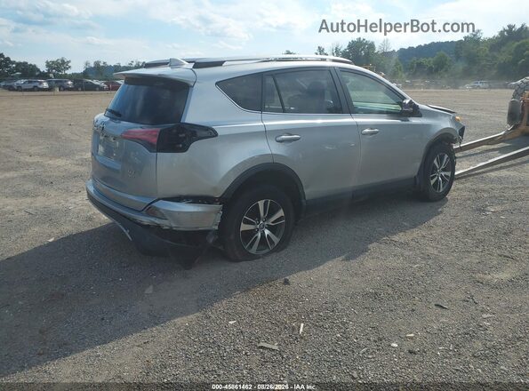JTMRFREV0JJ242863 2018 TOYOTA RAV4 Gray Rear right