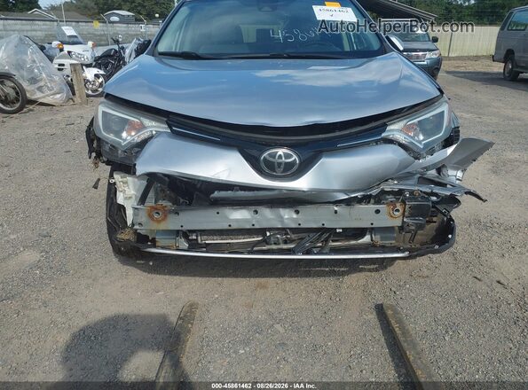 JTMRFREV0JJ242863 2018 TOYOTA RAV4 Gray Front view