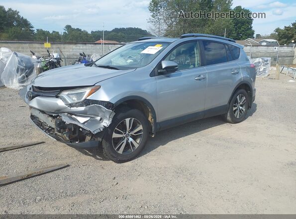 JTMRFREV0JJ242863 2018 TOYOTA RAV4 Gray Front left