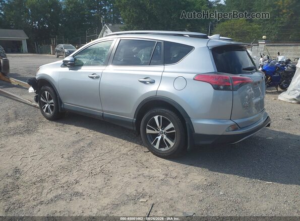 JTMRFREV0JJ242863 2018 TOYOTA RAV4 Gray Rear left