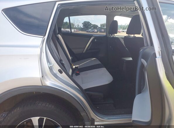 JTMRFREV0JJ242863 2018 TOYOTA RAV4 Gray VIN sticker view