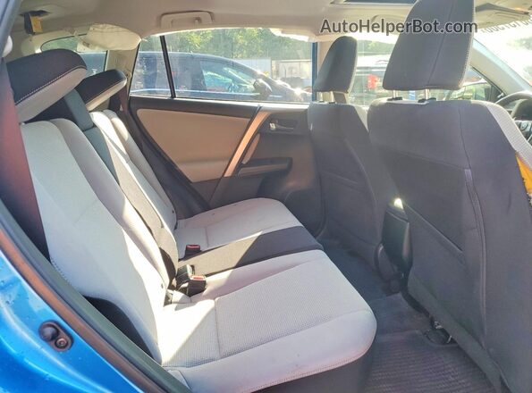 JTMRFREV1HJ111371 2017 TOYOTA RAV4 Синий Вид задней части салона