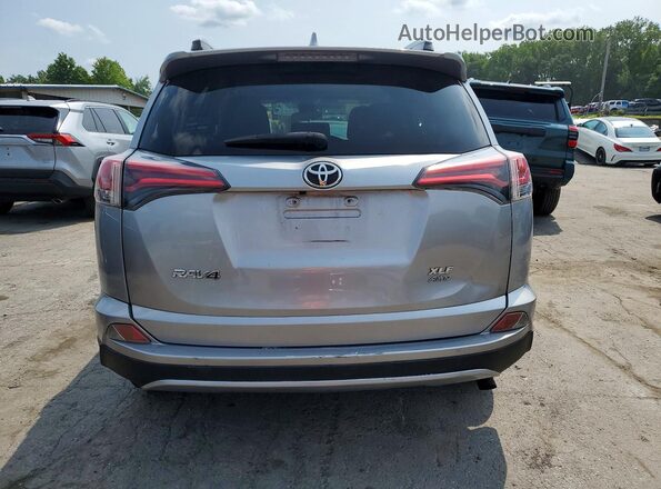 JTMRFREV1JJ188182 2018 TOYOTA RAV4 Gray Rear view
