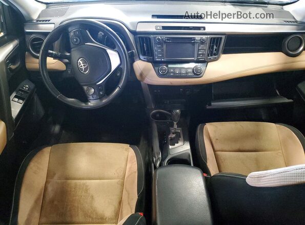 JTMRFREV2GJ067508 2016 TOYOTA RAV4 White Dashboard view
