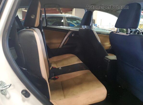 JTMRFREV2GJ067508 2016 TOYOTA RAV4 White Rear seats view
