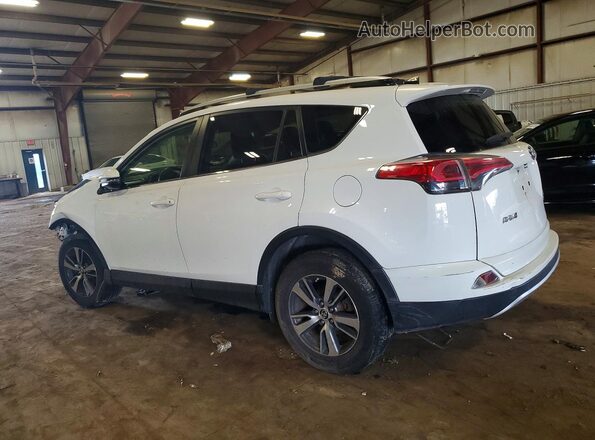 JTMRFREV2GJ067508 2016 TOYOTA RAV4 White Rear left