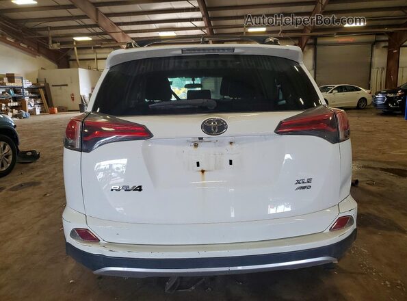 JTMRFREV2GJ067508 2016 TOYOTA RAV4 White Rear view