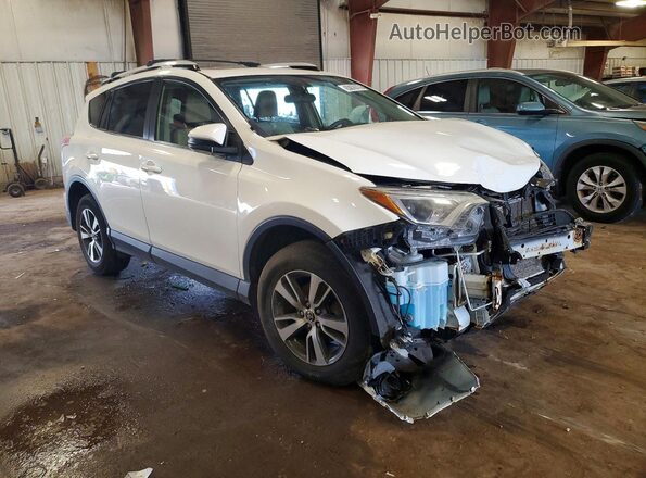 JTMRFREV2GJ067508 2016 TOYOTA RAV4 White Front right