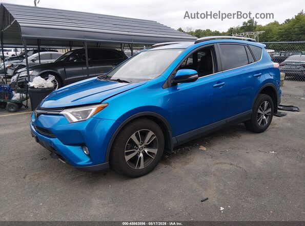 JTMRFREV2HJ714619 2017 TOYOTA RAV4 Black Front left