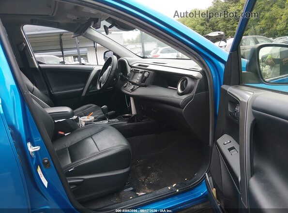 JTMRFREV2HJ714619 2017 TOYOTA RAV4 Black Front interior view