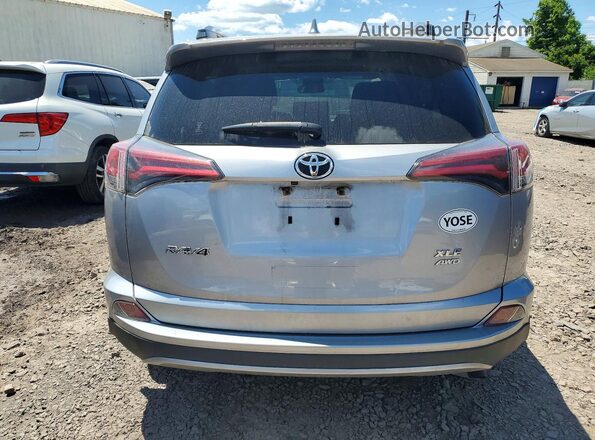 JTMRFREV2JD254110 2018 TOYOTA RAV4 Silver უკანა ხედი