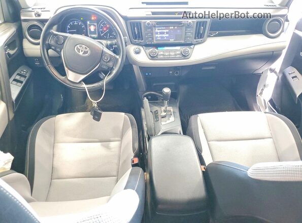JTMRFREV2JJ189518 2018 TOYOTA RAV4 White Առջևի վահանակի տեսք