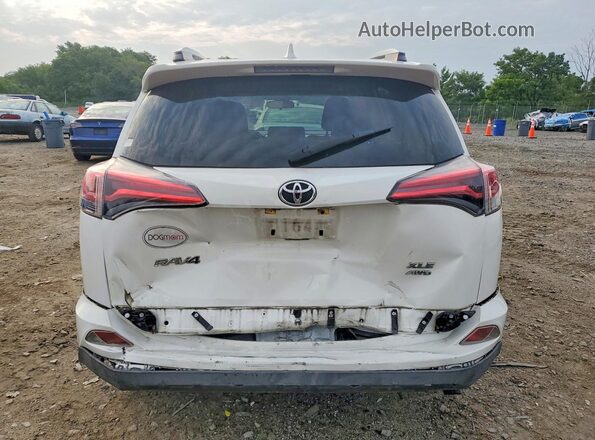 JTMRFREV2JJ723648 2018 TOYOTA RAV4 White Rear view