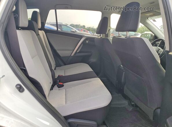 JTMRFREV2JJ723648 2018 TOYOTA RAV4 White Rear interior view