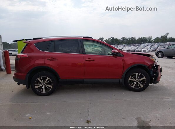 JTMRFREV3HJ111307 2017 TOYOTA RAV4 Red Вид задньої частини салону