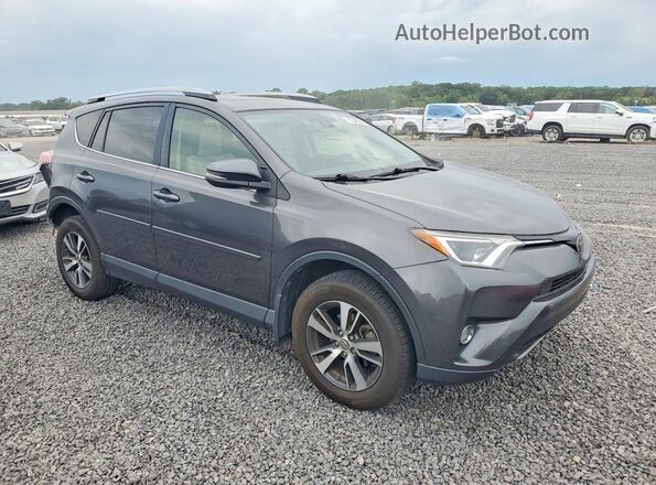 JTMRFREV3HJ117723 2017 TOYOTA RAV4 Gray Front right
