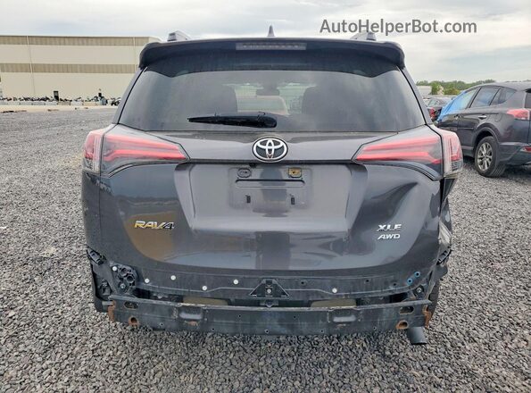 JTMRFREV3HJ117723 2017 TOYOTA RAV4 Gray Rear view