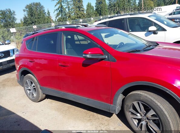 JTMRFREV3HJ123327 2017 TOYOTA RAV4 Red Widok wnętrza z tyłu