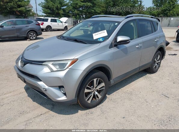 JTMRFREV3JD238255 2018 TOYOTA RAV4 Silver Առջևի ձախ երեք քառորդ տեսարան