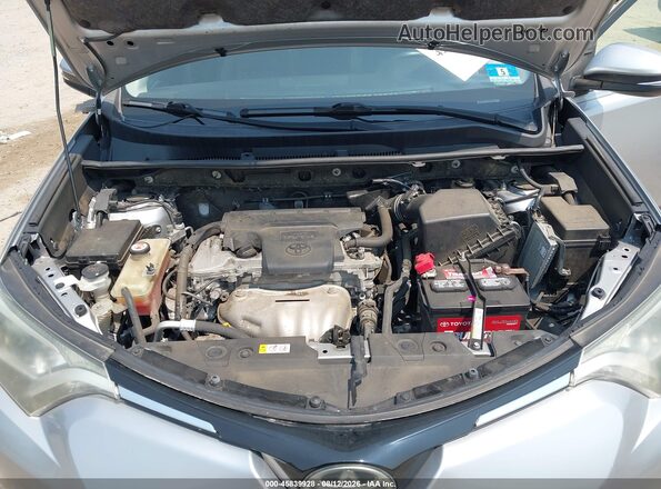 JTMRFREV3JD238255 2018 TOYOTA RAV4 Silver Հետևի տեսք