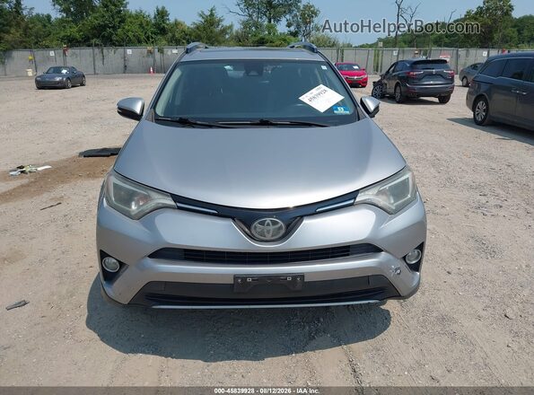 JTMRFREV3JD238255 2018 TOYOTA RAV4 Silver Սարքավորումների վահանակի տեսք