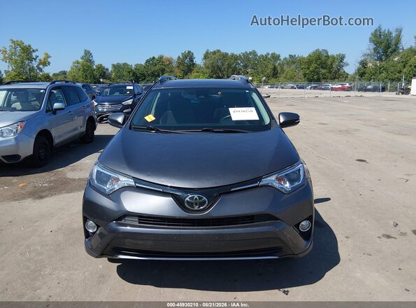 JTMRFREV3JJ236362 2018 TOYOTA RAV4 Gray Սարքավորումների վահանակի տեսք