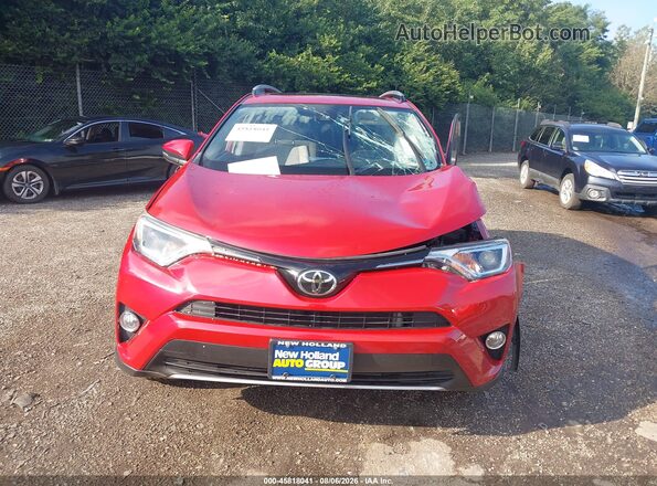 JTMRFREV4HJ117343 2017 TOYOTA RAV4 Red Առջևի վահանակի տեսք