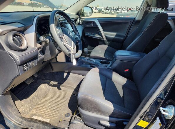 JTMRFREV4HJ711334 2017 TOYOTA RAV4 Blue წინა სალონის ხედი