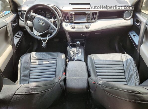 JTMRFREV4HJ716842 2017 TOYOTA RAV4 Серый Вид панели приборов