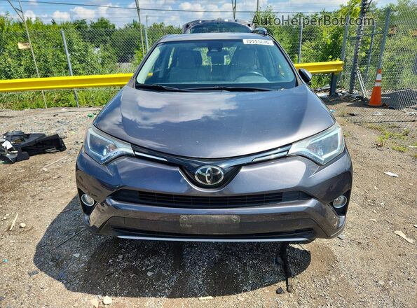 JTMRFREV4JJ720234 2018 TOYOTA RAV4 Gray Front view