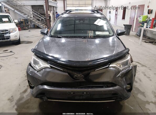 JTMRFREV5HJ118131 2017 TOYOTA RAV4 Gray ხელსაწყოთა პანელის ხედი