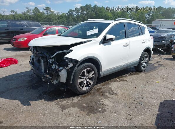 JTMRFREV6HJ124083 2017 TOYOTA RAV4 White Vista tres cuartos delantera izquierda