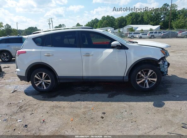 JTMRFREV6HJ124083 2017 TOYOTA RAV4 White Vista interior trasera