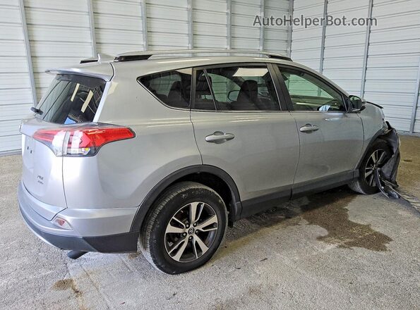 JTMRFREV6JJ221726 2018 TOYOTA RAV4 Silver Trasero derecho