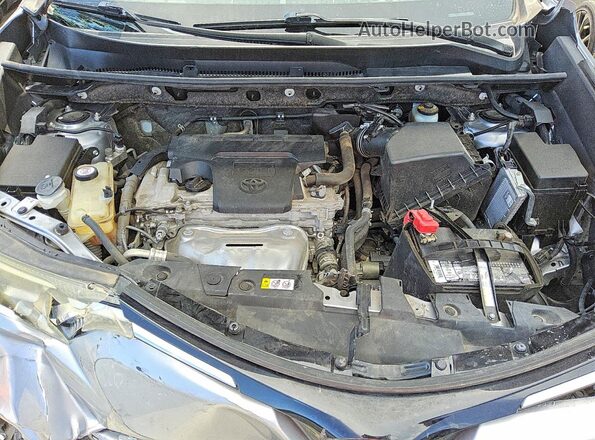 JTMRFREV6JJ221726 2018 TOYOTA RAV4 Silver Vista interior trasera