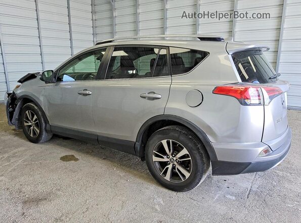 JTMRFREV6JJ221726 2018 TOYOTA RAV4 Silver Trasero izquierdo