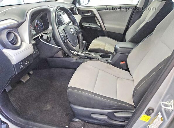 JTMRFREV6JJ221726 2018 TOYOTA RAV4 Silver Vista interior delantera
