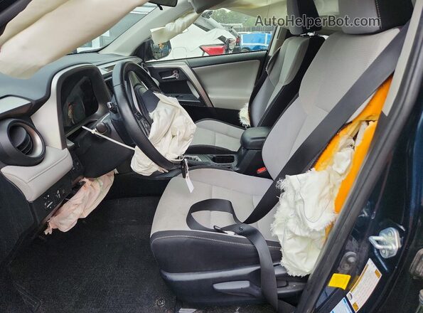 JTMRFREV6JJ233942 2018 TOYOTA RAV4 Blue Вид салону спереду