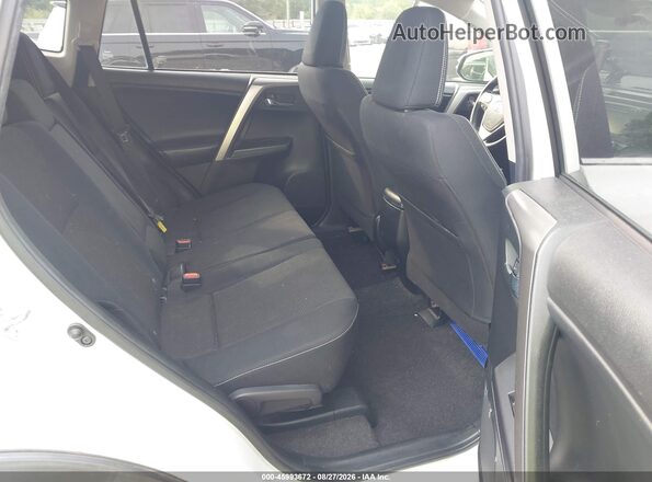 JTMRFREV6JJ719151 2018 TOYOTA RAV4 White Widok naklejki z numerem VIN