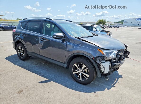 JTMRFREV7JD228151 2018 TOYOTA RAV4 Серый Передняя правая четверть
