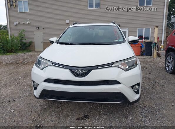 JTMRFREV7JD232555 2018 TOYOTA RAV4 White Սարքավորումների վահանակի տեսք